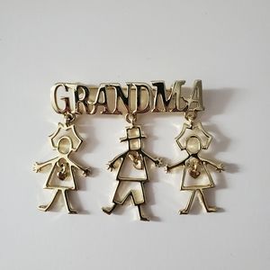 Grandma Pin Brooch in gold tone with three children on it. ~2.75" x 2" Like New!